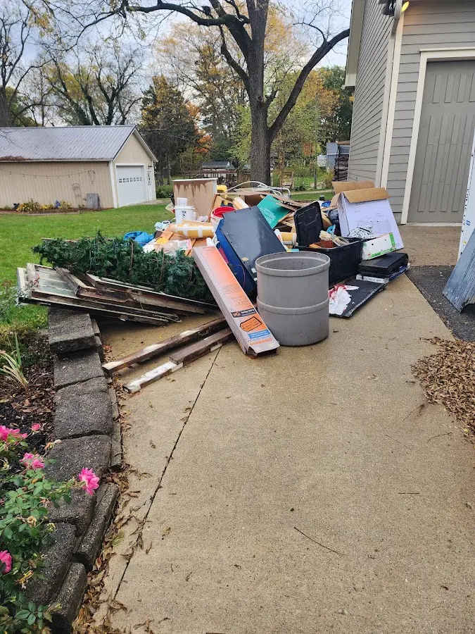 Dumpster being loaded with debris for Commercial Dumpster Rental in West Manheim